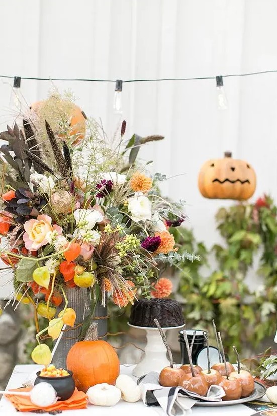 a cool halloween centerpiece with dried flowers