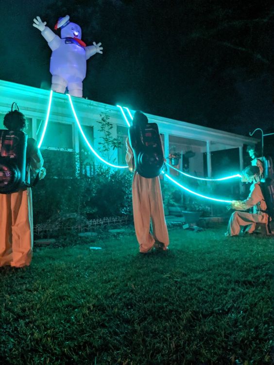 a cool Halloween outdoor scene with ghostbusters and a marshmallow man is amazing