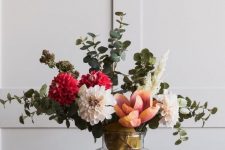a cool faux flower arrangement with greenery is a cool idea, you can make one yourself and it will be very long-lasting