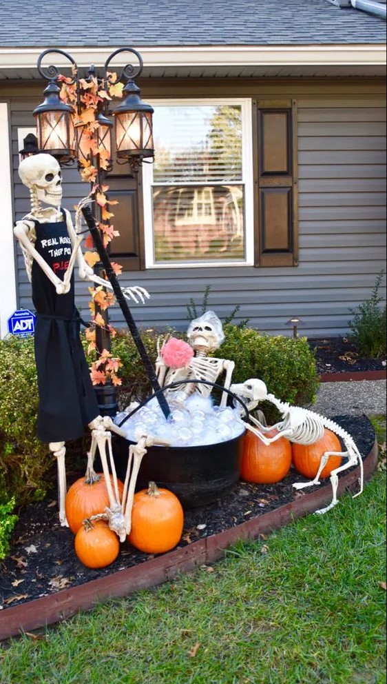 a fun and cool Halloween scene with a bathing skeleton, a skeleton in an apron and a dog skeleton is all fun