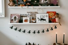 a fun and cool black witch garland will be a nice idea for a witch-themed Halloween or for styling a kids’ space for Halloween