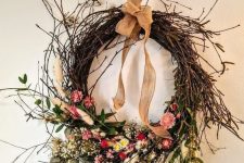 a pretty fall wreath of vine and twigs, dried flowers and leaves and a burlap bow on top is a super cool idea for the fall