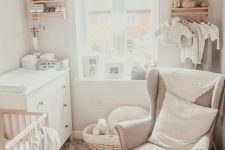 a cozy nursery with a makeshift closet