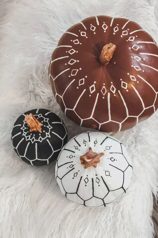 classy painted pumpkins decorated with white and black sharpies are amazing for boho fall or Halloween decor