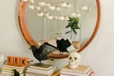a minimalist halloween mirror decor