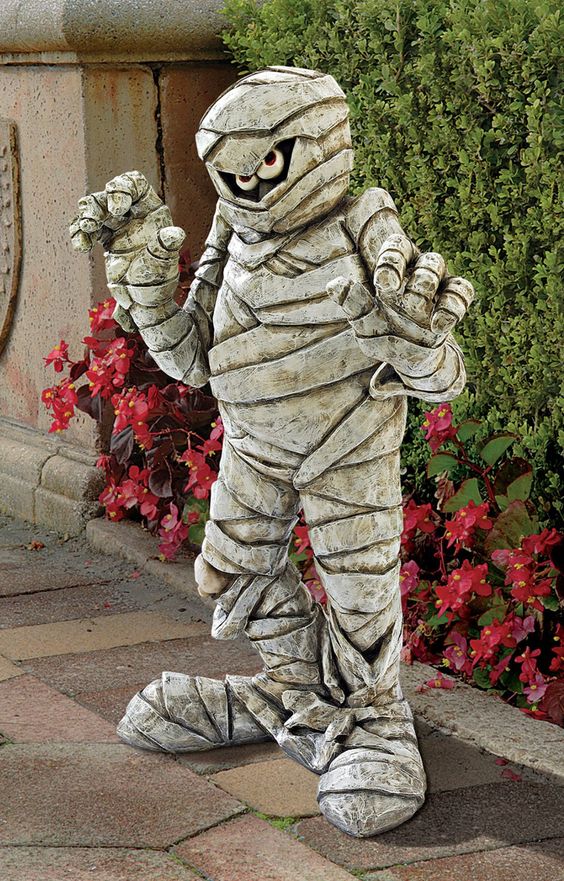 such a mummy garden statue will be a nice solution for outdoor Halloween decor