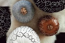 tribal pumpkins in black, white and rust decorated with a usual sharpie is a simple boho craft