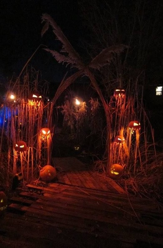 welcome treat or treaters in a really scary way with an arch surrounded by scary jack-o-lanterns