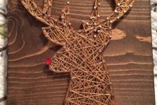 Rudolph the deer string art with a rhinestone red nose for Christmas