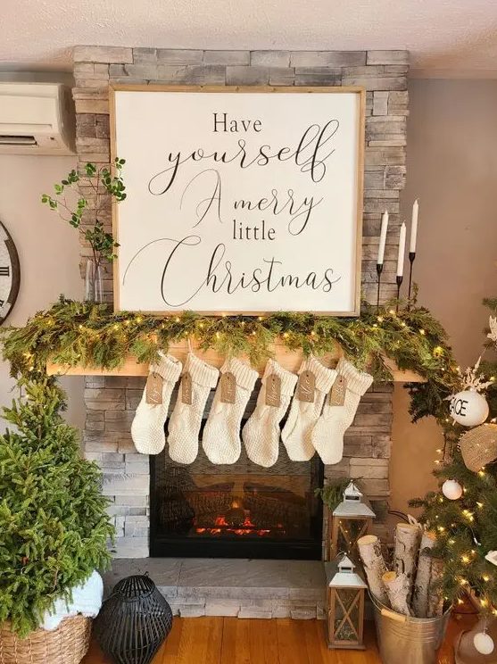 a cool calligraphy Christmas sign with a light-stained frame is a lovely idea for both indoors and outdoors