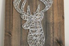 a deer head string art done in white will fit lots of spaces and will instantly bring a Christmassy and woodland feel to them