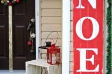 a red and white Christmas sign is a stylish and bold decor idea for outdoors, make one yourself