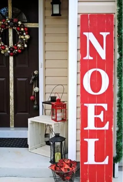 a red and white Christmas sign is a stylish and bold decor idea for outdoors, make one yourself