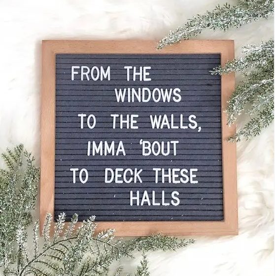 a simple and modern Christmas sign with letters in a frame is a cool idea to style your space for Christmas and not only