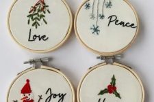 an arrangement of cool embroidery hoop Christmas ornaments with embroidery is an amazing decor idea