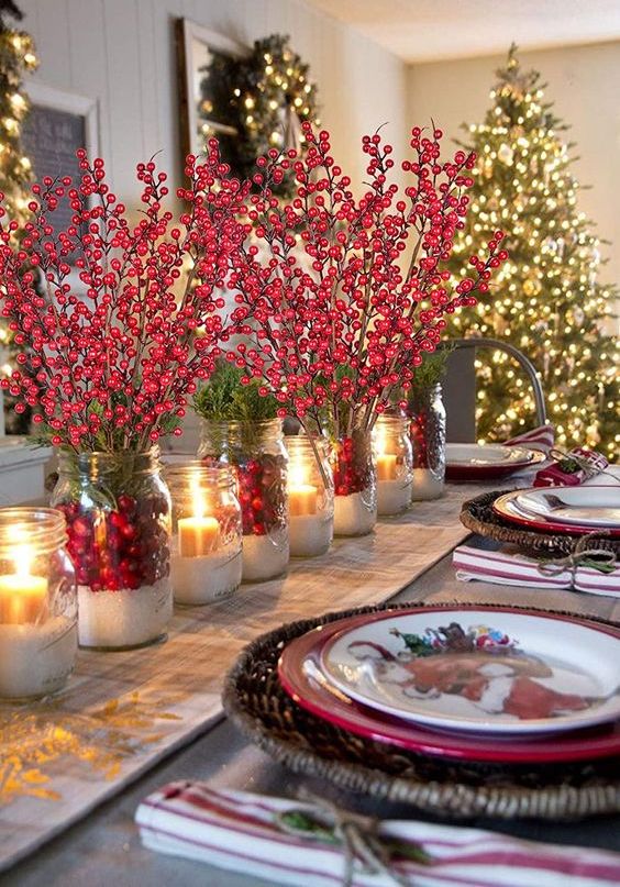 cool Christmas centerpieces of berries and candles are great to style your table for the holidays