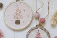 little pastel embroideyr hoop ornaments with Christmas trees embroidered and some beads