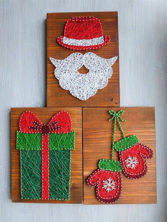 pretty Christmas-themed string art pieces with mittens, a gift and a Santa beard and hat all done in traditional Christmas colors