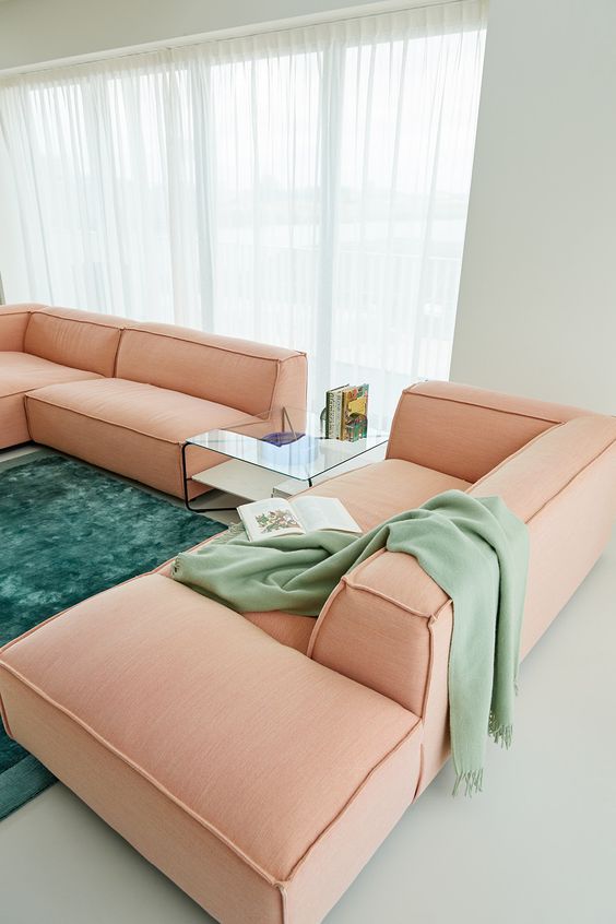 a trendy Peach Fuzz modular low sofa of several parts is a cool solution that is very functional