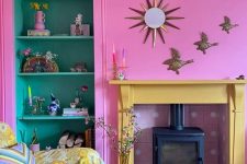 45 a hot pink living room with a hearth with a pink tile surround, built-in shelves, a bright printed sofa