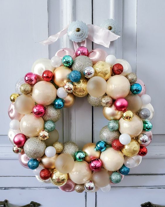 a colorful Christmas wreath composed of vintage ornaments is a lovely idea for the holidays