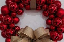a timeless red ornament Christmas wreath with a burlap bow is always a good idea as it’s very traditional