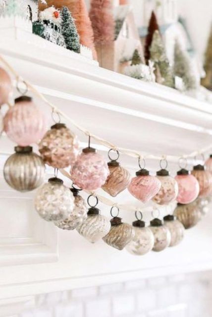 beautiful garlands composed of vintage Christmas ornaments look very chic and stylish