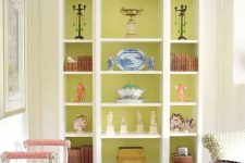 31 a storage unit with open shelves and chartreuse backing is a fantastic idea, this color makes your decor stand out