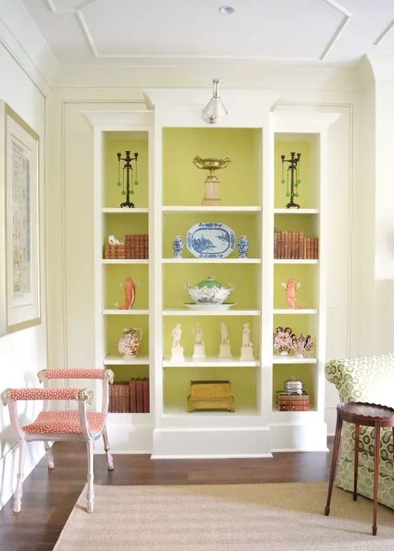 a storage unit with open shelves and chartreuse backing is a fantastic idea, this color makes your decor stand out