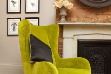 37 a bold chartreuse chair with a black pillow is a cool color accent to the space, it will make it brighter