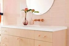 a cute bathroom with a floating vanity