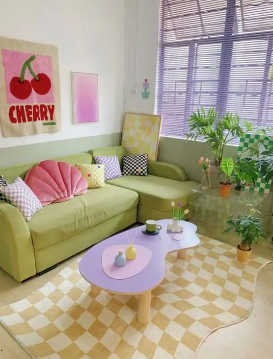 a bright living room with lilac shades, a chartreuse sofa, a lilac table, some checked pieces and pillows