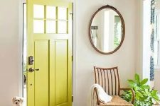 a chartreuse painted door is a unique touch of color to the space that will raise your interior to the new level