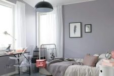 a modern grey and lilac teen girl bedroom with eclectic furniture, neutral textiles and a pendant lamp