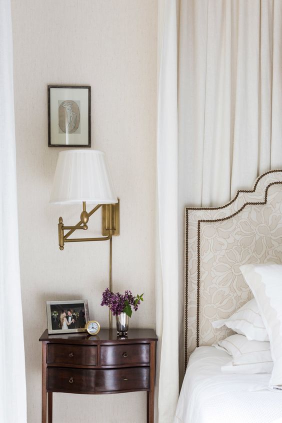 a small dark-stained nightstand will create a bold contrast in a neutral bedroom, it will add chic
