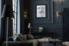 a sophisticated Goth living room with double-height ceiling, soot walls, dark furniture, a unique flower-inspired chandelier