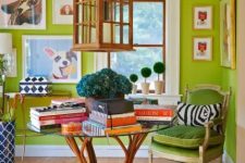 a super bold chartreuse room with a colorful extended gallery all, a glass table, a chartreuse chair and a lantern