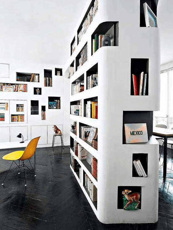 a gorgeous home library idea - lots of built-in bookshelves with black backing to make your books stand out