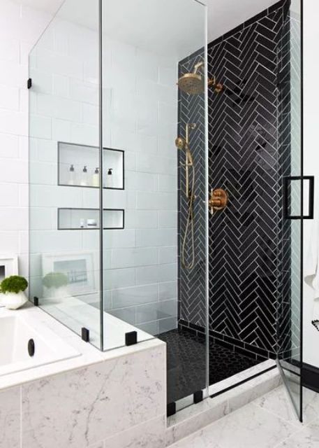 a stylish modern shower space with a black herringbone accent wall is a cool idea for modern bathrooms