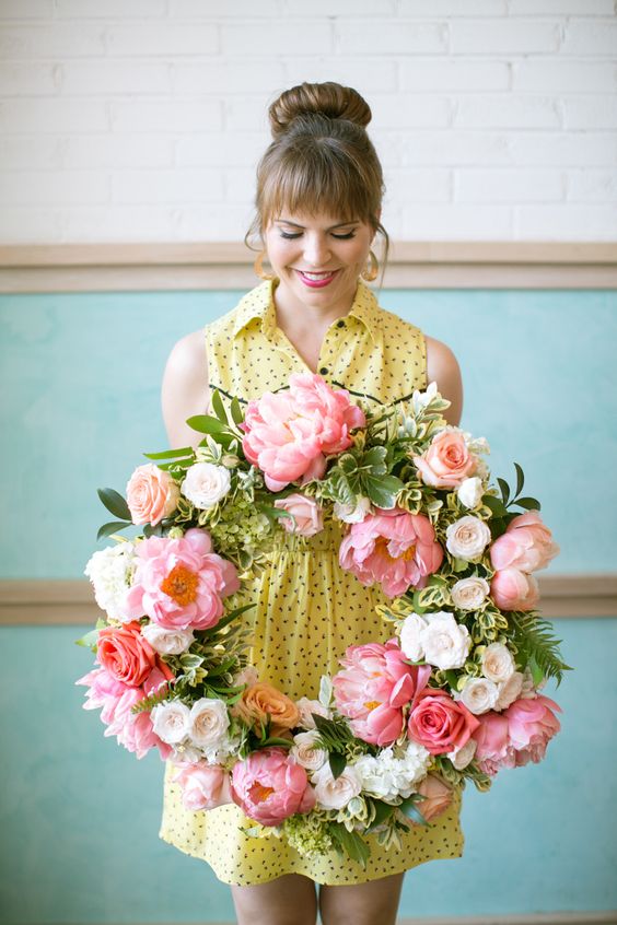 a super lush spring wreath with white and pink blooms and greenery is a classic idea for the season