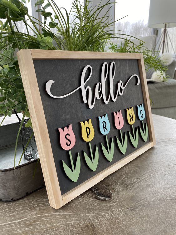 a cool spring sign with colorful tulips showing letters and calligraphy will be a nice idea for a spring mantel