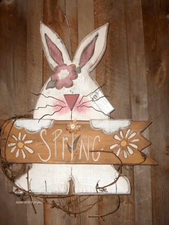 a fun spring sign with a bunny holding a sign is a simple creative idea for decorating your space with a bit of cuteness