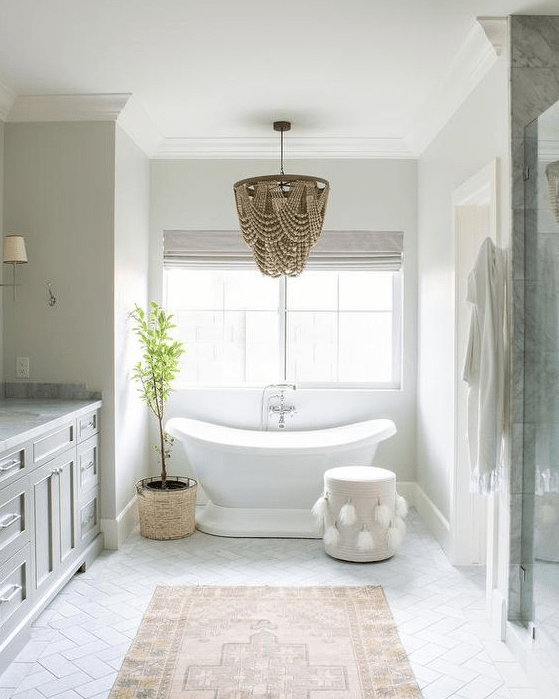a gorgeous glam bathroom chandelier that differs in color and makes a statement in the space with its wow look