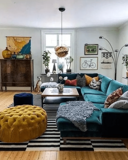 a cozy living room with a large sectional