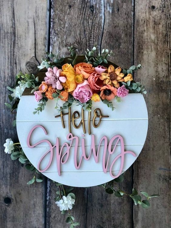 a lovely modern sign of plaques, with bright faux blooms and letters is a cool idea for spring or summer