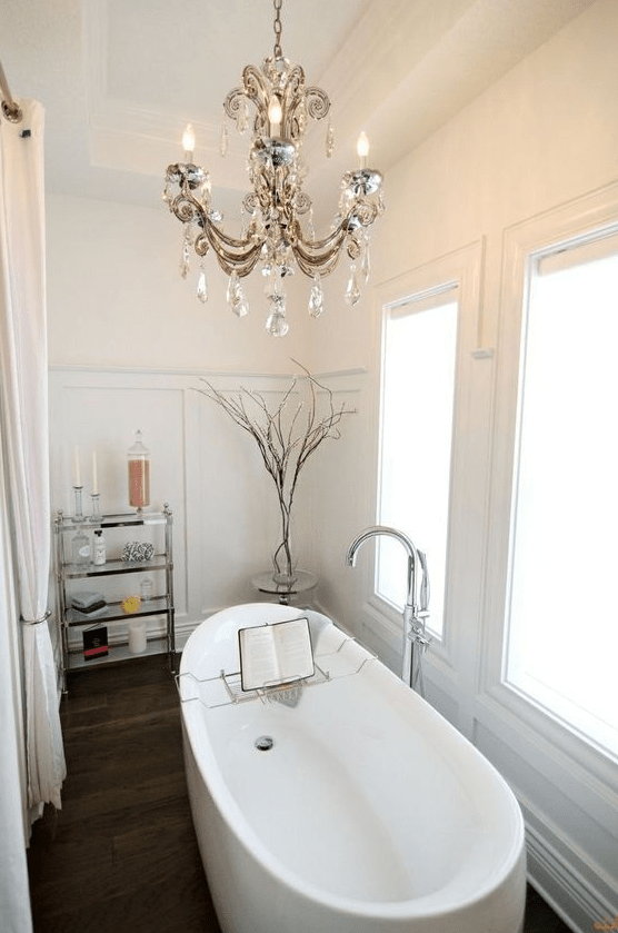 a refined and elegant crystal chandelier will make your bathroom super beautiful and stunning