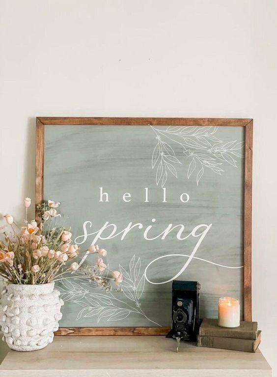 a simple and cool framed spring sign can be easily made for spring and Easter and will match many interiors