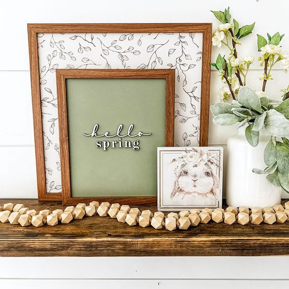 a spring sign trio of black and white leaves, words and a cute bunny is a perfect idea for seasonal decor