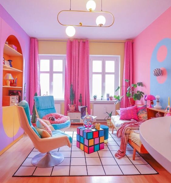 A super fun dopamine decor living room with colorful walls and built in storage, bright chairs, a sofa with bold pillows and coffee tables