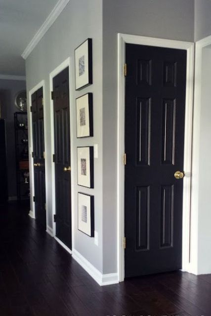 grey walls, black doors with brass hardware are a lovely combo for a farmhouse space, it looks more refined and chic